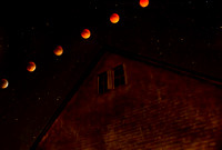 Lunar eclipse over a barn