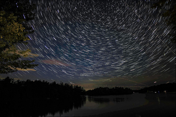 Star trails over Damariscotta Lake