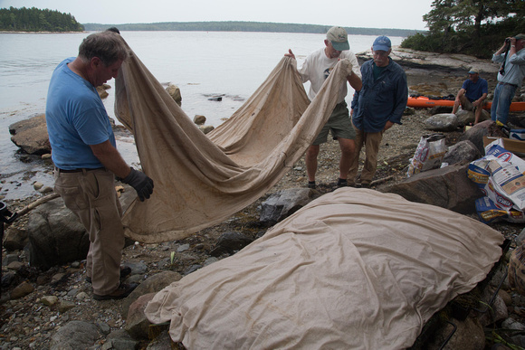Then put on a second canvas tarp soaked in seawater.